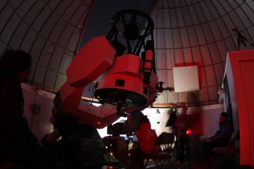 Picture of students using telescope